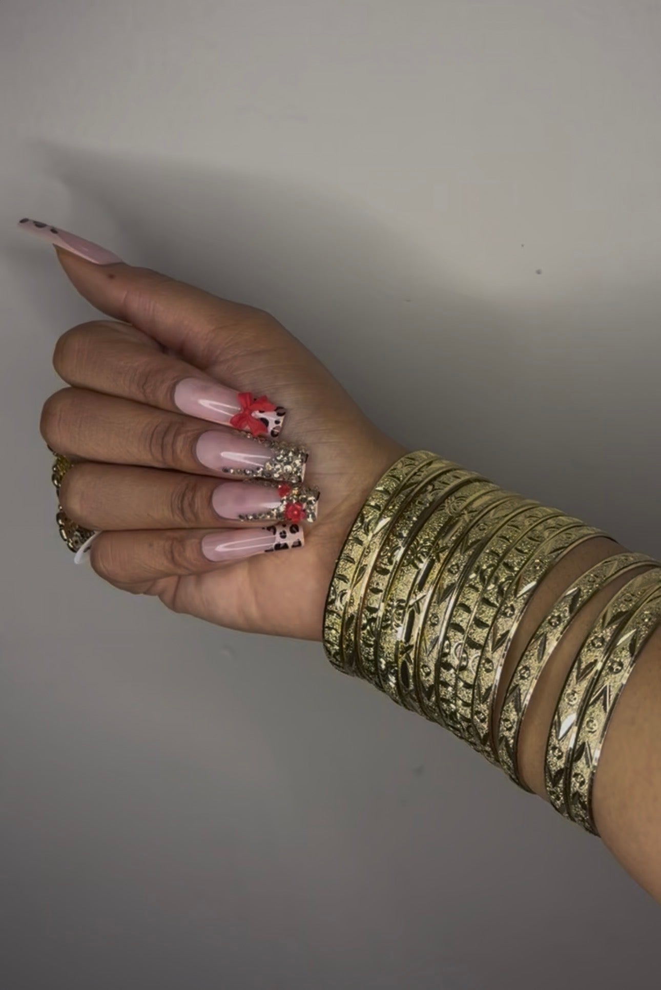 12 pack of Gold Bangles