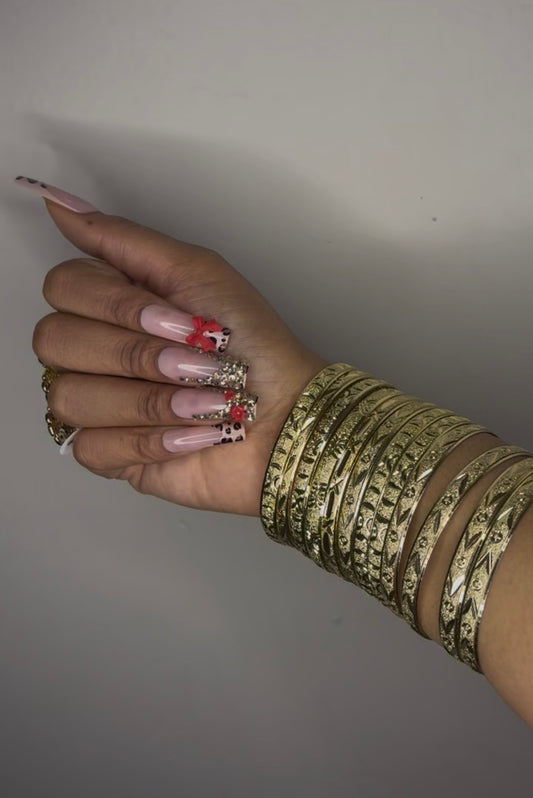 12 pack of Gold Bangles